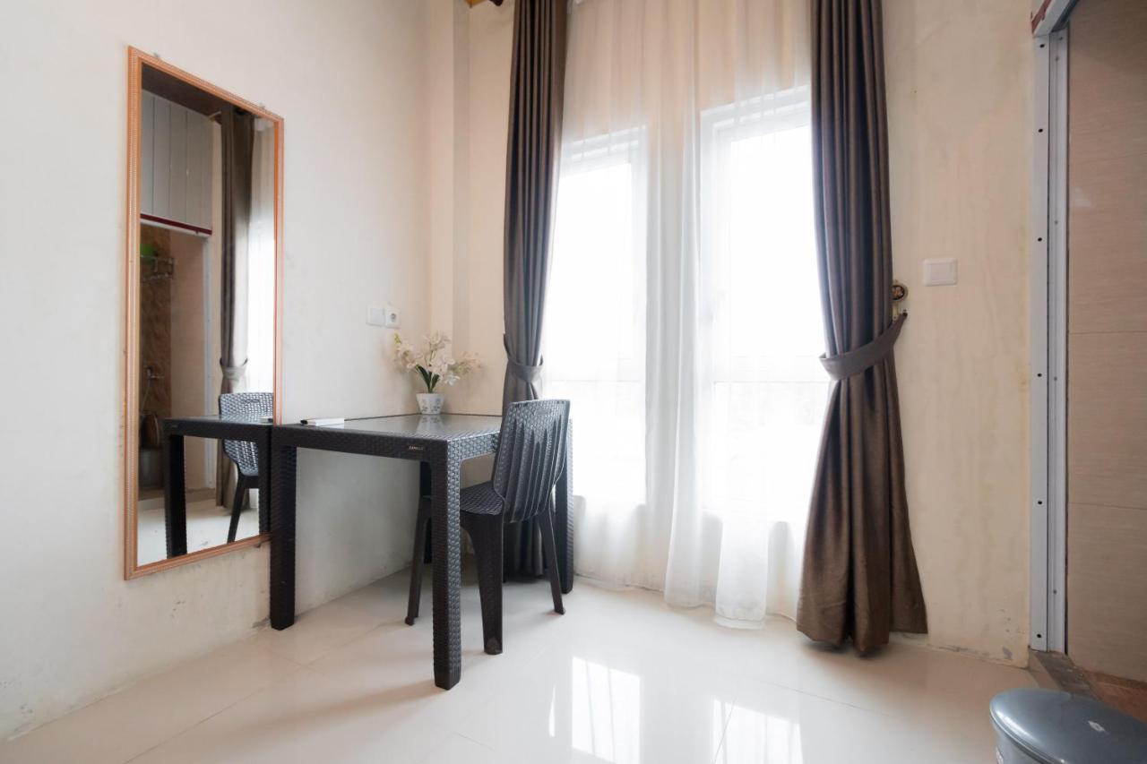 โอโย 1648 เปงีนาปัน ทรี โจเย Hotel ปาดัง ภายนอก รูปภาพ